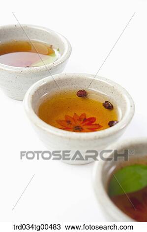 Cups of various tea with fruits and leaves View Large Photo Image Stock Image - Cups of various tea with fruits and leaves. Fotosearch