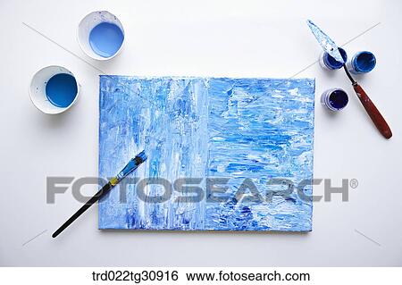 Stock Photograph - Horizontal and vertical paints on canvas in blue tone. Fotosearch