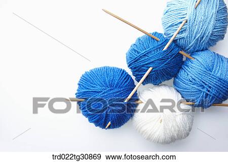 Knitting yarn balls in blue tone and needles View Large Photo Image Stock Photo - Knitting yarn balls in blue tone and needles. Fotosearch