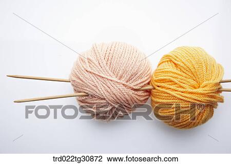 Knitting yarn balls in pink and orange and needles View Large Photo Image Stock Image - Knitting yarn balls in pink and orange and needles. Fotosearch