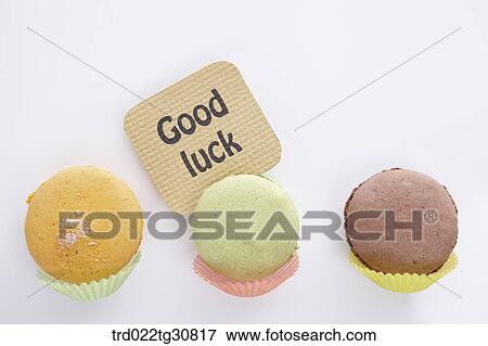 Stock Photo - Macarons and a good luck message. Fotosearch