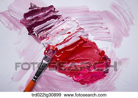 Stock Photo - Paints in red tones and a brush. Fotosearch
