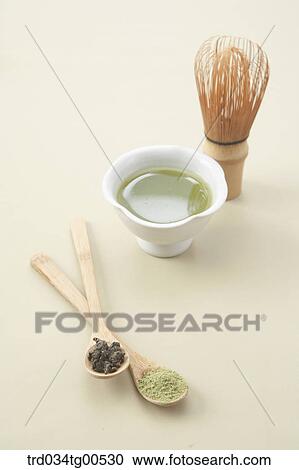 Stock Image - Spoons of tea and a tea tool. Fotosearch