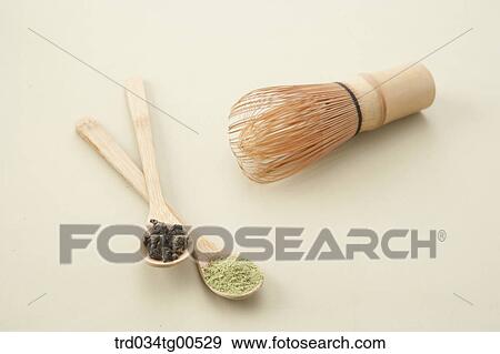 Stock Photo - Spoons of tea and a tea tool. Fotosearch