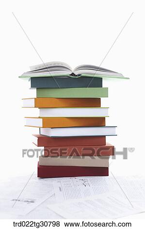 Stock Photo - Stacks of books and test papers. Fotosearch