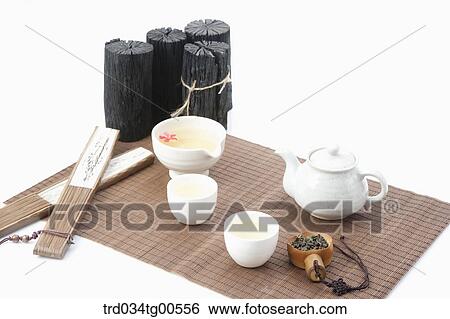 Tea set with charcoal and fans View Large Photo Image Stock Photograph - Tea set with charcoal and fans. Fotosearch