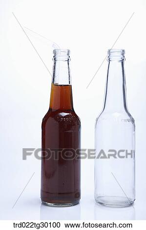 A bottle full of drink and another bottle being empty View Large Photo Image Stock Image - A bottle full of drink and another bottle being empty . Fotosearch