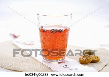 Stock Photo - A cup of drink and Korean dessert . Fotosearch