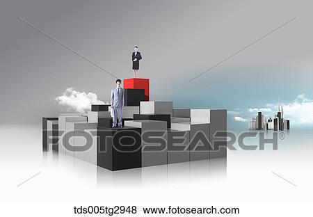 A man and woman standing on black and red box View Large Photo Image Stock Photo - A man and woman standing on black and red box. Fotosearch