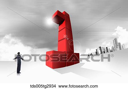 Picture - A man looking at number on shaped boxes. Fotosearch