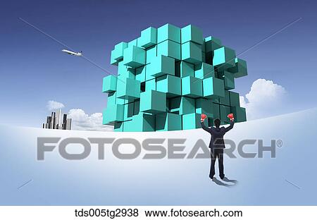 A man looking at piled blue boxes View Large Photo Image Stock Photo - A man looking at piled blue boxes. Fotosearch