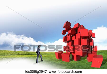 A man walking toward piled red boxes View Large Photo Image Stock Photo - A man walking toward piled red boxes . Fotosearch