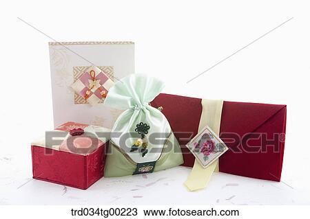 A red traditional envelope, lucky bag, box, and card View Large Photo Image Stock Image - A red traditional envelope, lucky bag, box, and card. Fotosearch