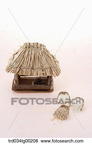 A straw house with small strainers View Large Photo Image Stock Photo - A straw house with small strainers. Fotosearch