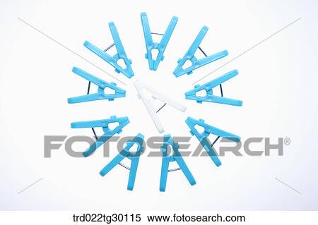 A white clothespin with blue clothespins around View Large Photo Image Stock Photography - A white clothespin with blue clothespins around. Fotosearch