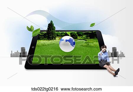 A woman sitting on green tablet PC View Large Photo Image Stock Photograph - A woman sitting on green tablet PC. Fotosearch