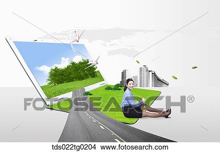 A woman with the road heading for green laptop View Large Photo Image Picture - A woman with the road heading for green laptop . Fotosearch