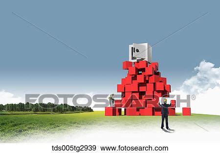 Stock Photo - An architect looking at blueprint with red boxes and safe around. Fotosearch