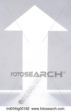 Stock Image - arrow sign and coins in a row. Fotosearch