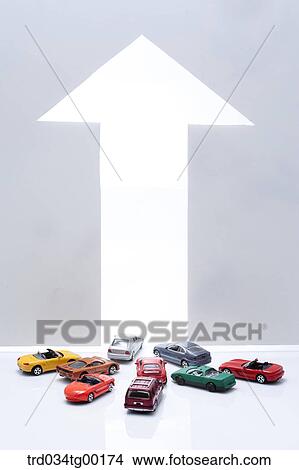 arrow sign and miniature cars View Large Photo Image Picture - arrow sign and miniature cars. Fotosearch