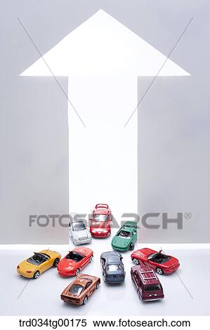 arrow sign and miniature cars View Large Photo Image Stock Photography - arrow sign and miniature cars. Fotosearch