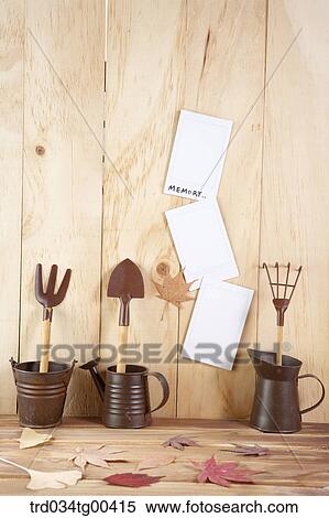 Autumn With Fallen Leaves And Garden Tools View Large Photo Image Stock Photography - Autumn With Fallen Leaves And Garden Tools. Fotosearch