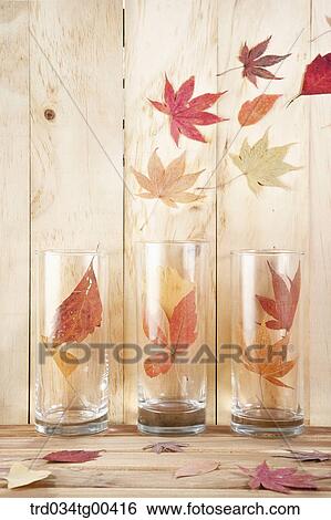 Stock Photograph - Autumn With Fallen Leaves And Glass. Fotosearch