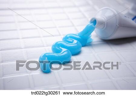 Stock Image - Blue tooth paste from tube. Fotosearch