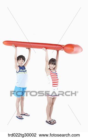 boy and girl are standing with raising bed of tube together View Large Photo Image Stock Image - boy and girl are standing with raising bed of tube together. Fotosearch