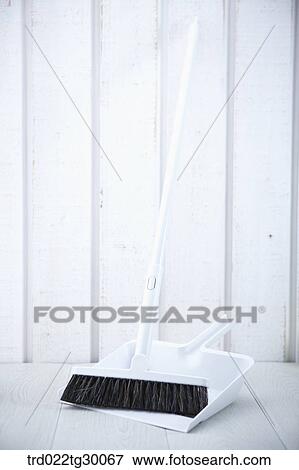Stock Photo - broom with dustpan. Fotosearch