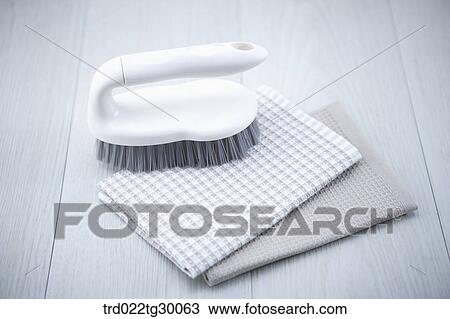 Stock Image - brush and discloth. Fotosearch
