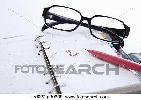 Stock Photo - Calendar And Glasses. Fotosearch