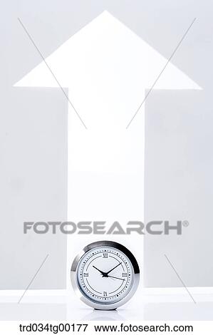 Stock Photo - clock and arrow sign. Fotosearch