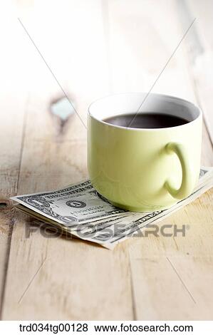 coffee on the money bills View Large Photo Image Stock Photo - coffee on the money bills. Fotosearch