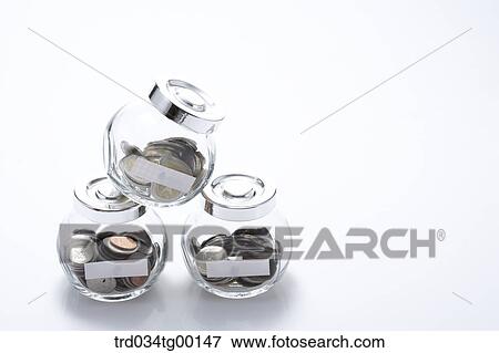 coins in glass bottle View Large Photo Image Stock Photo - coins in glass bottle. Fotosearch