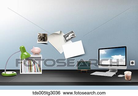 Stock Photograph - Desk With Green Lamp And Piggybank. Fotosearch