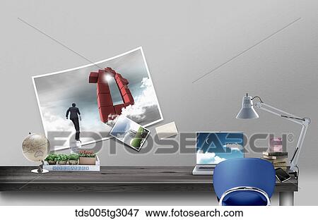 Stock Photo - Desk With Laptop And Blue Chair. Fotosearch