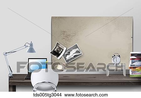 Picture - Desk With Laptop And White Chair. Fotosearch