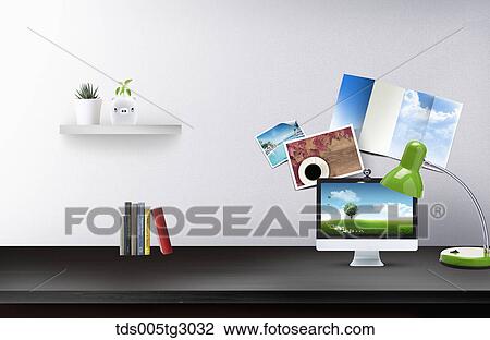 Stock Image - Desk With Monitor And Green Lamp. Fotosearch