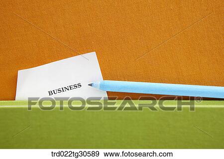 Different Colors Of Books With Pencil And A Piece Of Paper View Large Photo Image Stock Photo - Different Colors Of Books With Pencil And A Piece Of Paper. Fotosearch