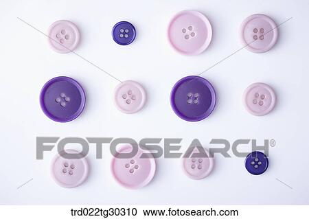 Stock Image - Different Sizes And Colors Of Round Buttons. Fotosearch