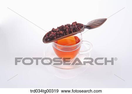 Dried fruit and a cup of tea View Large Photo Image Stock Photo - Dried fruit and a cup of tea . Fotosearch