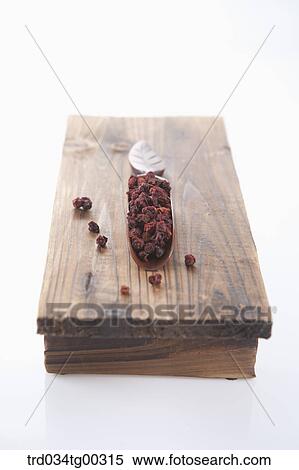 Dried fruit on the wooden dish View Large Photo Image Stock Photography - Dried fruit on the wooden dish . Fotosearch