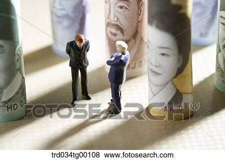 figures and rolled paper bills View Large Photo Image Stock Photo - figures and rolled paper bills. Fotosearch