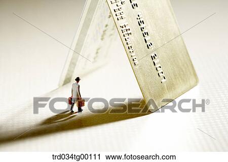 figures stood under the credit cards View Large Photo Image Stock Image - figures stood under the credit cards. Fotosearch