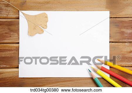 Four Color Pencils And A Fallen Leaf Over White Paper View Large Photo Image Stock Image - Four Color Pencils And A Fallen Leaf Over White Paper. Fotosearch