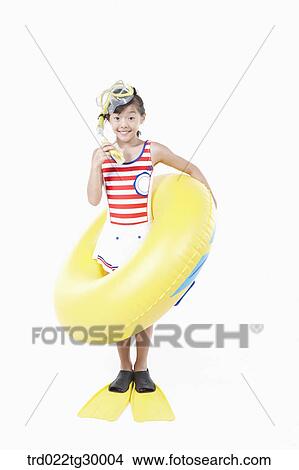 girl is wearing snorkels and tube and flippers View Large Photo Image Picture - girl is wearing snorkels and tube and flippers. Fotosearch