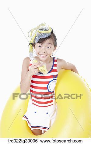 girl is wearing snorkels and tube View Large Photo Image Stock Photograph - girl is wearing snorkels and tube. Fotosearch