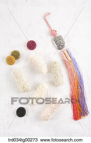 Korean dessert and colorful traditional accessory View Large Photo Image Stock Image - Korean dessert and colorful traditional accessory. Fotosearch
