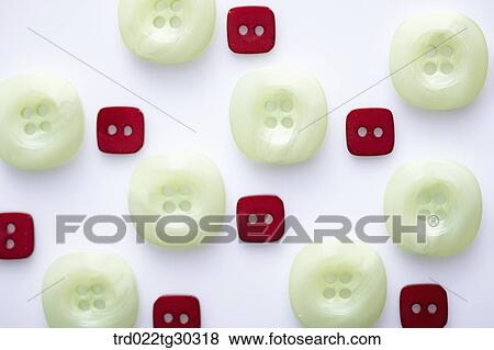 Large Jade Buttons And Red Square Button View Large Photo Image Stock Photo - Large Jade Buttons And Red Square Button. Fotosearch